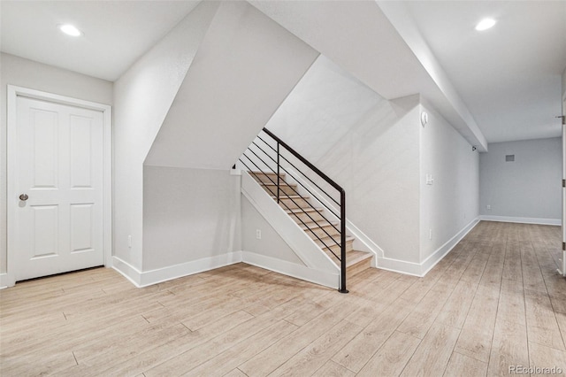 467 Harrison St, Denver, CO 80206 - additional living space featuring wood finished floors, stairs, and recessed lighting