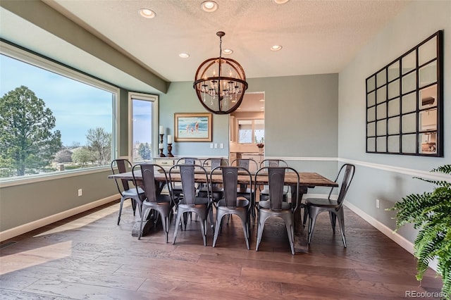 6013 S Kittredge Ct, Centennial, CO 80016 - dining space with baseboards, plenty of natural light, recessed lighting, and a notable chandelier
