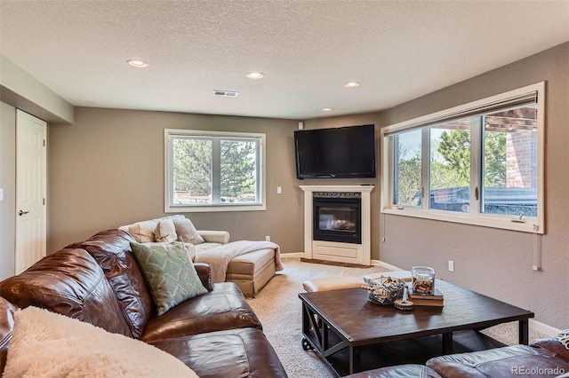 6013 S Kittredge Ct, Centennial, CO 80016 - living area with recessed lighting, baseboards, visible vents, and light colored carpet