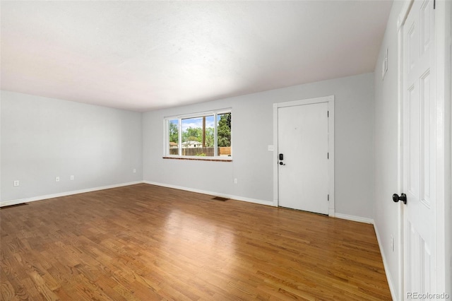 1406 N Foote Ave, Colorado Springs, CO 80909 - unfurnished room with wood finished floors and baseboards