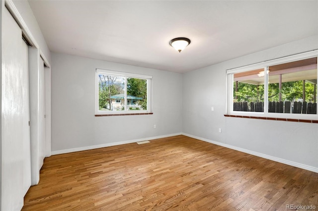 1406 N Foote Ave, Colorado Springs, CO 80909 - unfurnished bedroom featuring light wood-style flooring and a closet