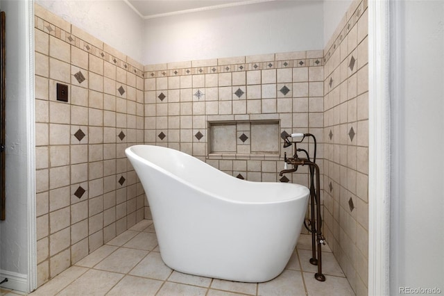 1406 N Foote Ave, Colorado Springs, CO 80909 - full bathroom featuring tile walls, a soaking tub, tile patterned floors, and ornamental molding