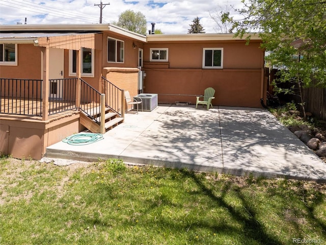 1406 N Foote Ave, Colorado Springs, CO 80909 - back of house featuring a patio and stucco siding