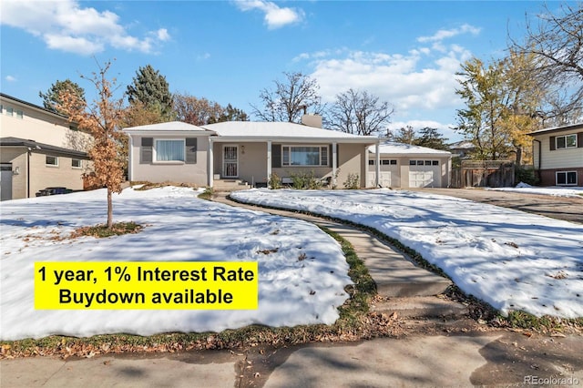 view of front of property featuring a garage