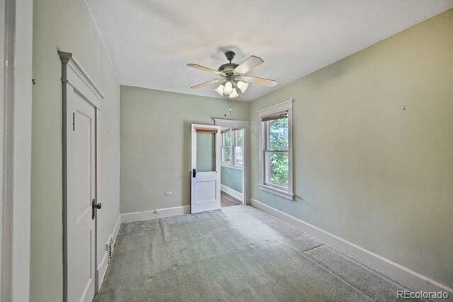 321 S Gilpin St, Denver, CO 80209 - unfurnished bedroom featuring carpet floors and a ceiling fan