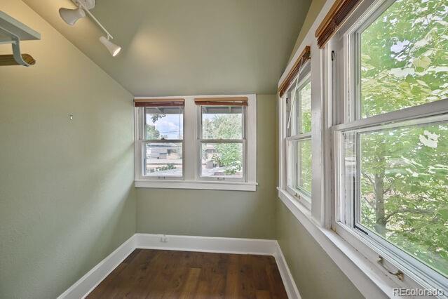 321 S Gilpin St, Denver, CO 80209 - unfurnished sunroom featuring lofted ceiling