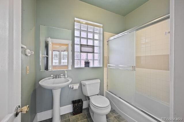 321 S Gilpin St, Denver, CO 80209 - full bath featuring toilet and enclosed tub / shower combo