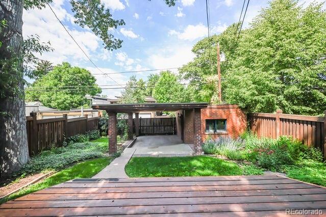 321 S Gilpin St, Denver, CO 80209 - wooden deck featuring a fenced backyard