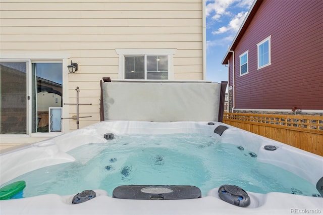 exterior space featuring a hot tub