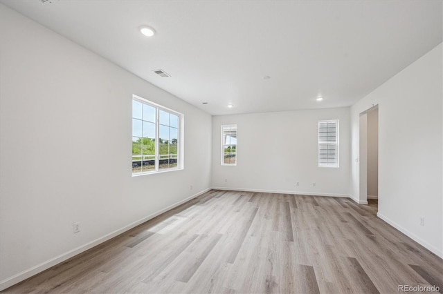 4246 Graywood Dr, Johnstown, CO 80534 - spare room featuring light wood-type flooring, baseboards, and recessed lighting