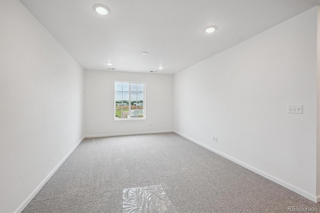 4246 Graywood Dr, Johnstown, CO 80534 - carpeted empty room with baseboards and recessed lighting