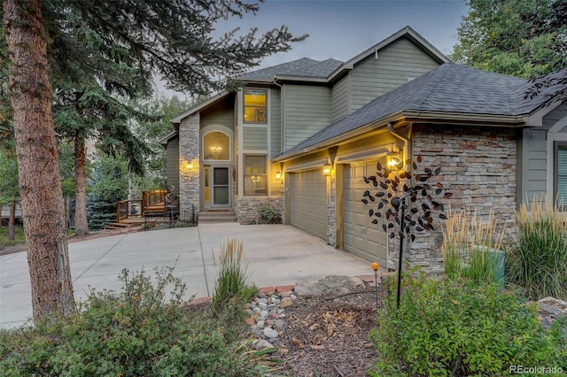 view of front of home with a garage