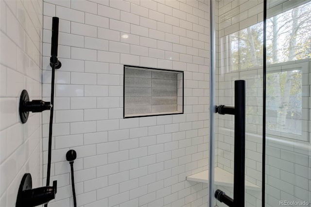 bathroom with an enclosed shower