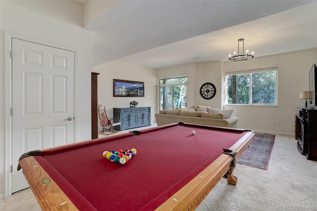 recreation room with light carpet, billiards, and a chandelier