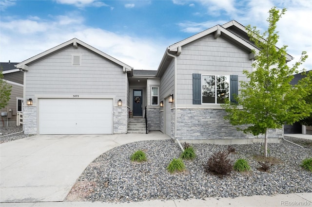 5072 Silver Hare Ln, Castle Rock, CO 80104 - craftsman inspired home featuring stone siding, a garage, and driveway