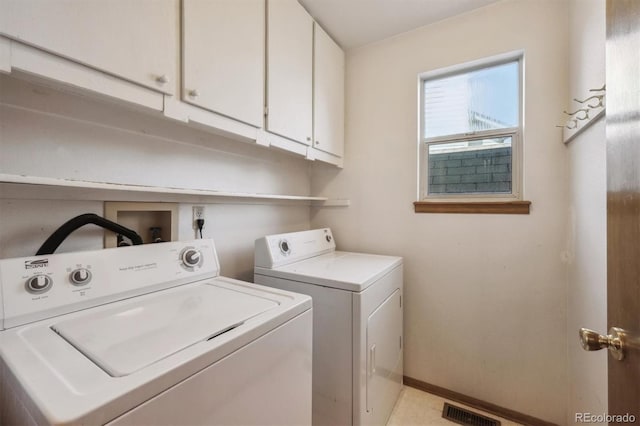 9908 Garfield Ct, Thornton, CO 80229 - clothes washing area featuring washer and dryer, cabinet space, and baseboards