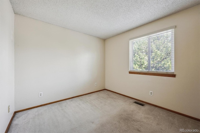 9908 Garfield Ct, Thornton, CO 80229 - empty room featuring carpet, baseboards, and a textured ceiling