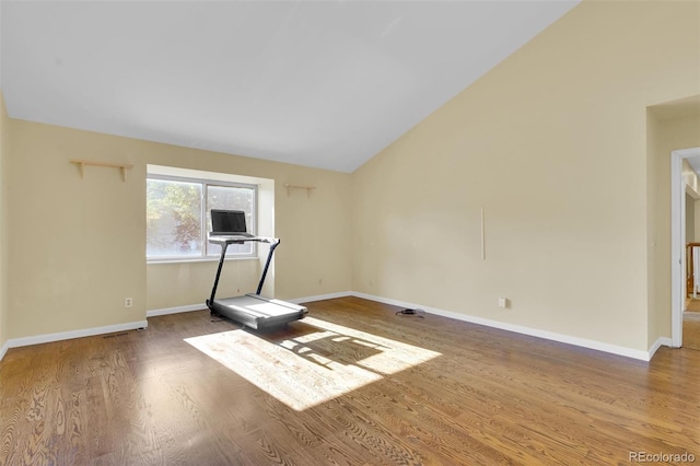 5622 E Weaver Cir, Centennial, CO 80111 - workout area with wood finished floors, lofted ceiling, and baseboards