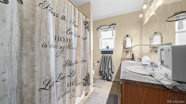 80 Cliff View Cir, Parachute, CO 81635 - full bath featuring double vanity, tile patterned flooring, and a shower with curtain