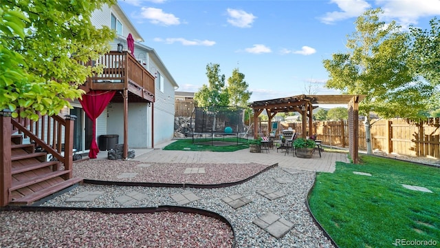 80 Cliff View Cir, Parachute, CO 81635 - fenced backyard featuring a trampoline, a pergola, and a patio