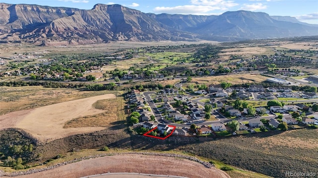 80 Cliff View Cir, Parachute, CO 81635 - aerial perspective of suburban area featuring a mountainous background