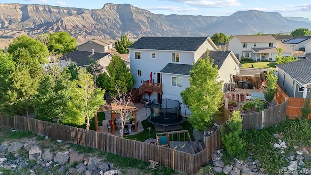 80 Cliff View Cir, Parachute, CO 81635 - aerial perspective of suburban area with a mountainous background