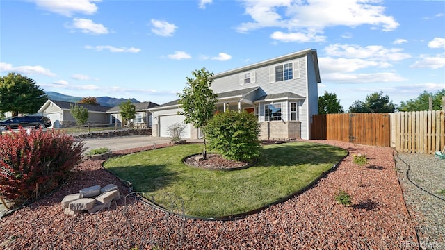 80 Cliff View Cir, Parachute, CO 81635 - traditional-style home with a garage, driveway, and brick siding