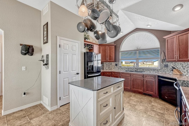 55610 E 40th Ave, Strasburg, CO 80136 - kitchen featuring black appliances, backsplash, lofted ceiling, a textured wall, and a textured ceiling
