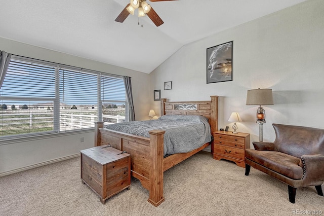 55610 E 40th Ave, Strasburg, CO 80136 - bedroom with lofted ceiling, light carpet, and a ceiling fan