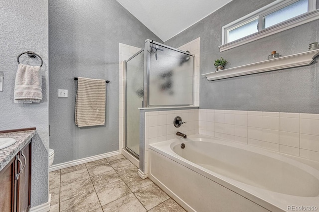 55610 E 40th Ave, Strasburg, CO 80136 - bathroom with a garden tub, a textured wall, a shower stall, lofted ceiling, and vanity