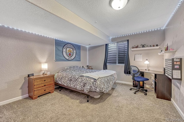55610 E 40th Ave, Strasburg, CO 80136 - carpeted bedroom with a textured ceiling, an office area, and a textured wall