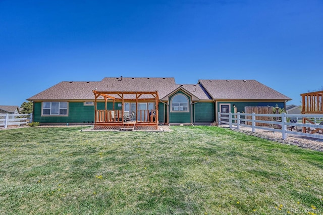 55610 E 40th Ave, Strasburg, CO 80136 - back of house with a pergola, a fenced backyard, and a deck