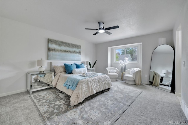 bedroom featuring carpet floors, baseboards, and ceiling fan