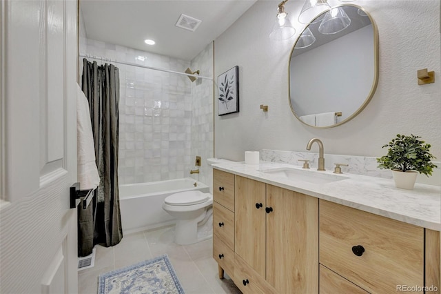 full bath with visible vents, tile patterned flooring, shower / bath combo, vanity, and toilet