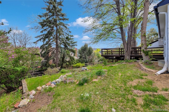 view of yard featuring a deck