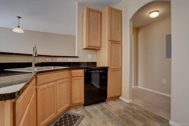 kitchen featuring sink, black dishwasher, pendant lighting, light brown cabinetry, and light wood-type flooring