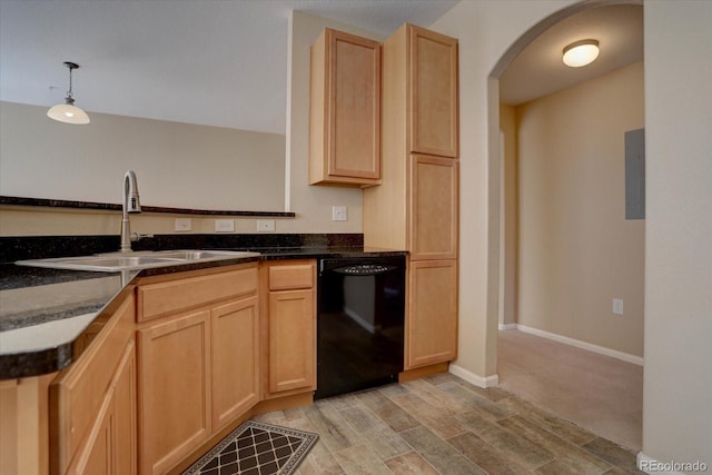 kitchen featuring dishwasher, light brown cabinetry, arched walkways, and a sink
