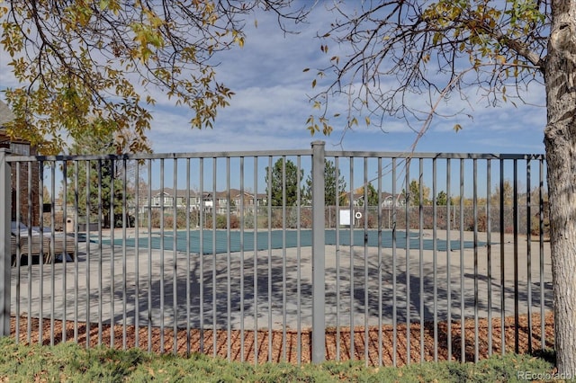 community pool with fence