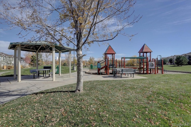 view of jungle gym with a lawn