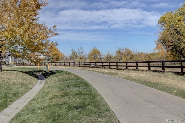 view of community featuring a yard