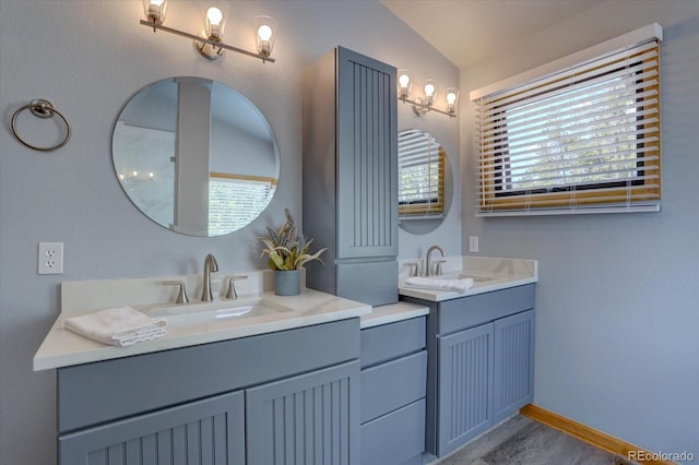 32091 Black Widow Dr, Conifer, CO 80433 - full bathroom with two vanities and lofted ceiling