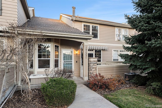 view of front of home with central air condition unit