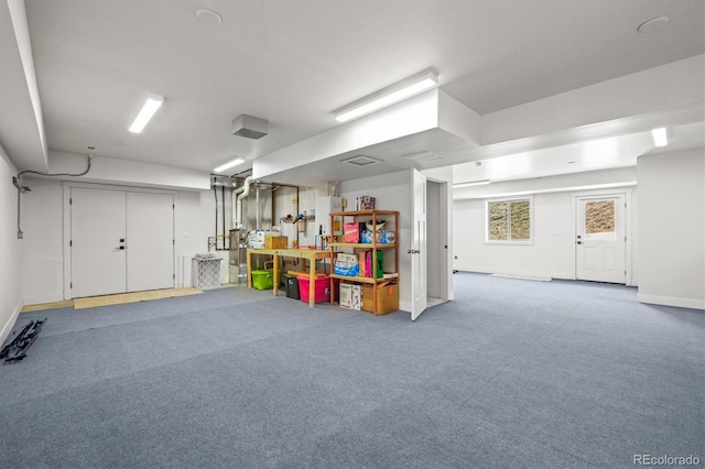 garage with baseboards