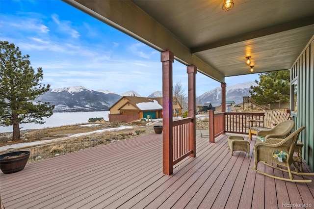 wooden terrace featuring a mountain view