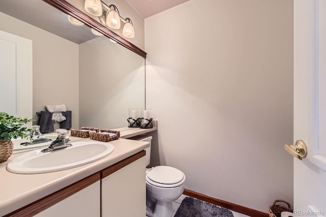 7166 Newhall Dr, Highlands Ranch, CO 80130 - bathroom featuring vanity and toilet