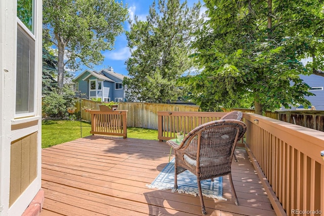 7166 Newhall Dr, Highlands Ranch, CO 80130 - wooden deck with a fenced backyard