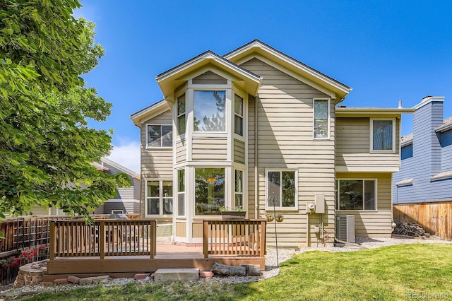 7166 Newhall Dr, Highlands Ranch, CO 80130 - back of house with a deck and a fenced backyard
