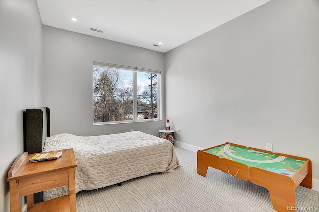 bedroom featuring baseboards, visible vents, and recessed lighting