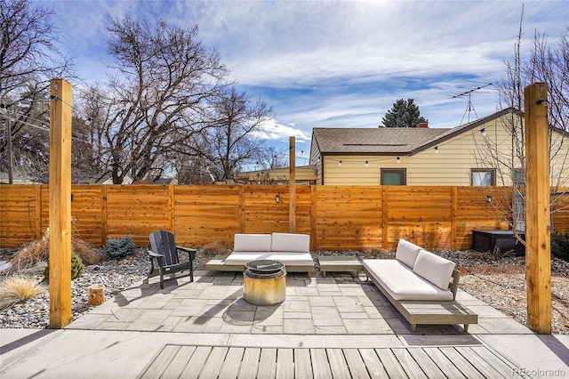 view of patio / terrace with fence private yard and an outdoor living space