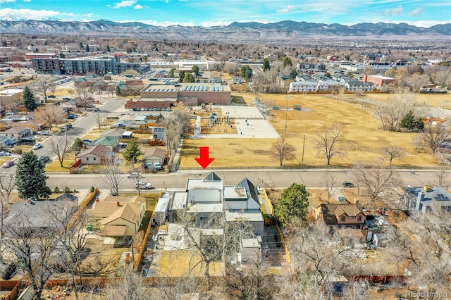 birds eye view of property featuring a residential view and a mountain view